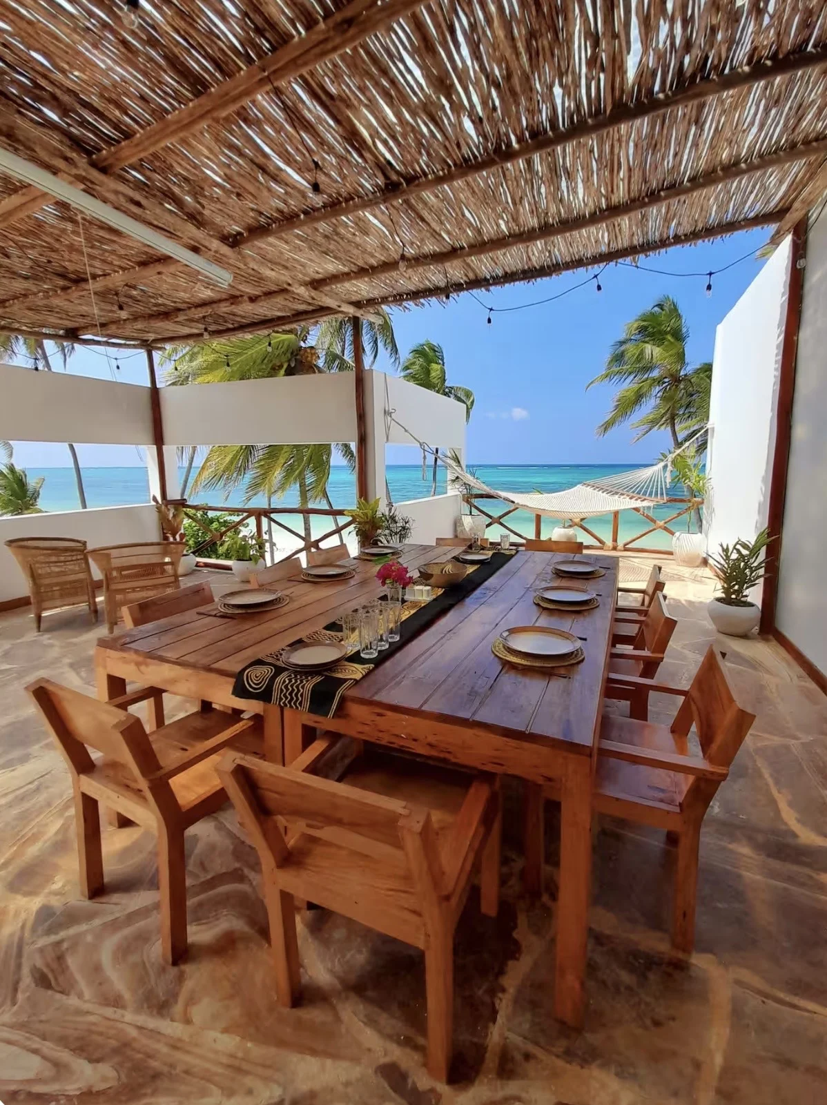 Shared dining terrace facing the sea