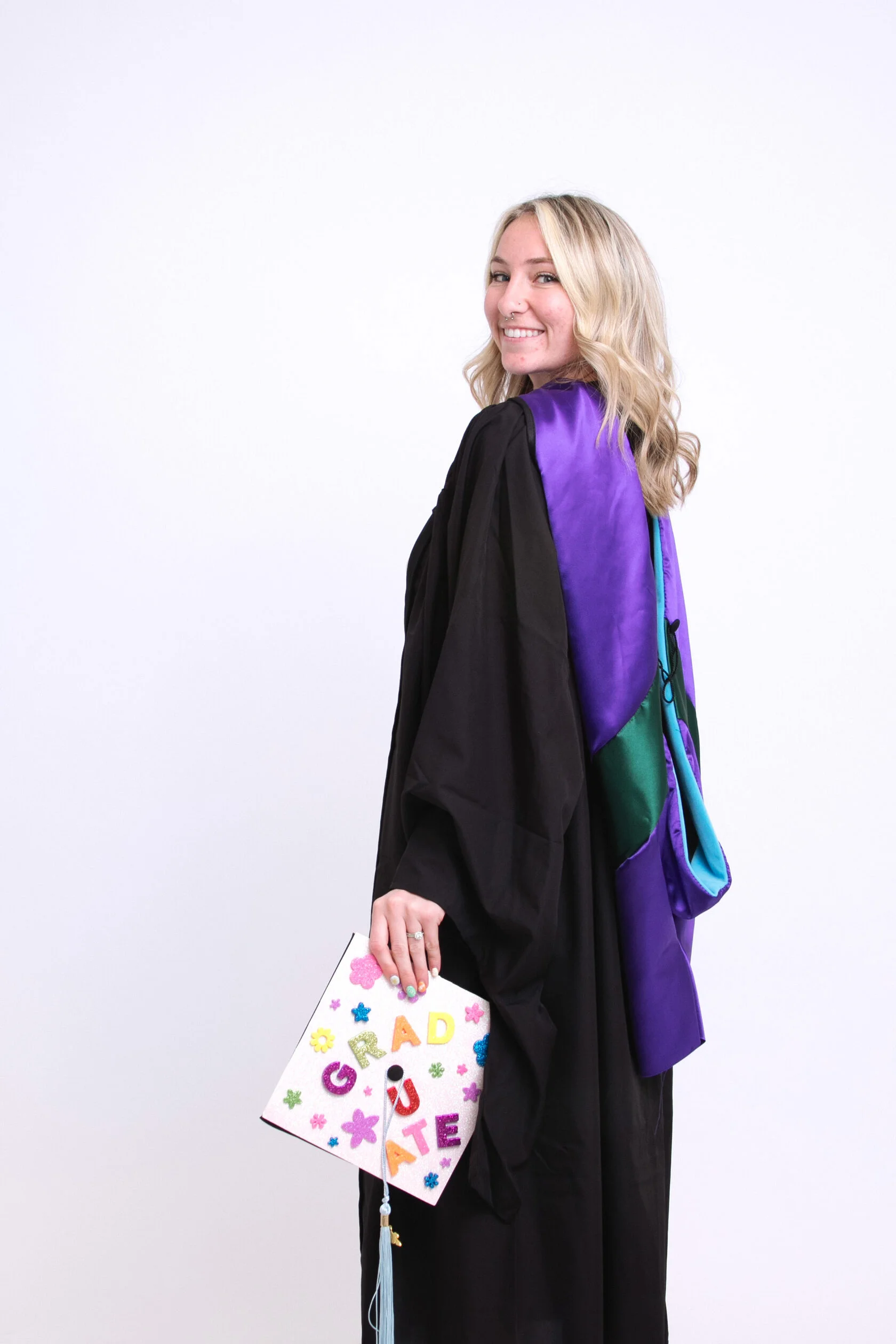 Solo graduation photoshoot with professional lighting in San Francisco