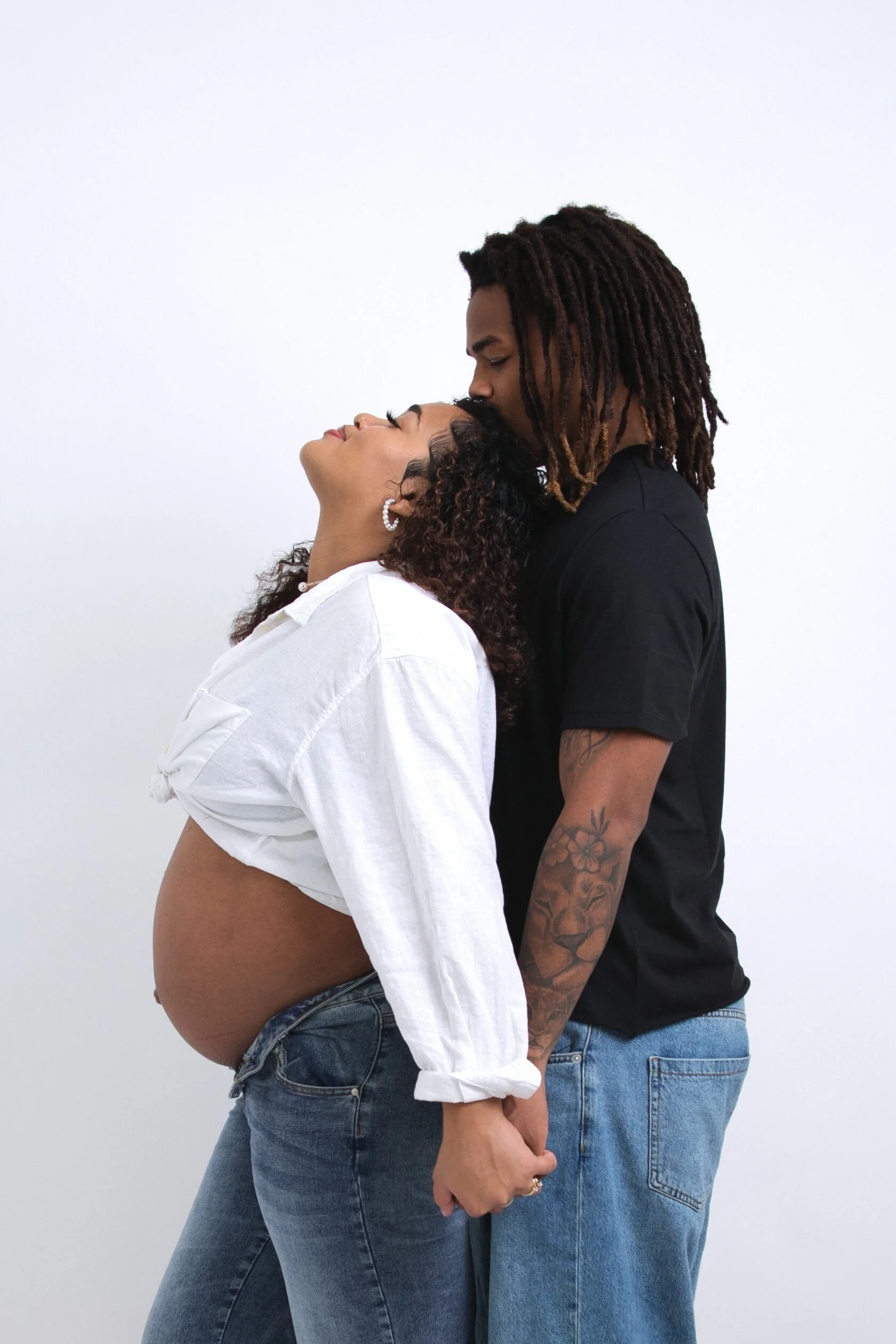 Pregnancy photo session with soft lighting in a private San Francisco studio