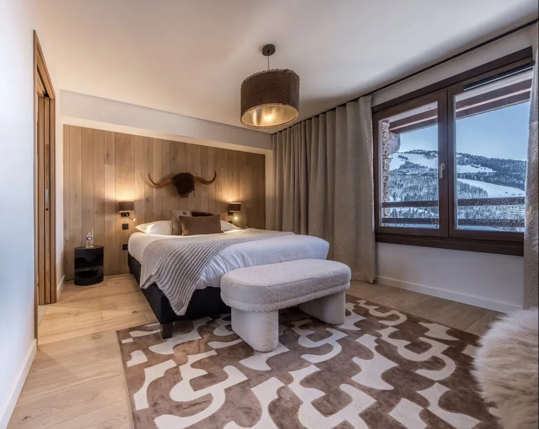 Chalet bedroom with mountain view