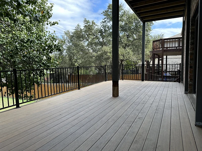 Wood to composite deck upgrade Austin TX — two level terrace restoration with composite boards