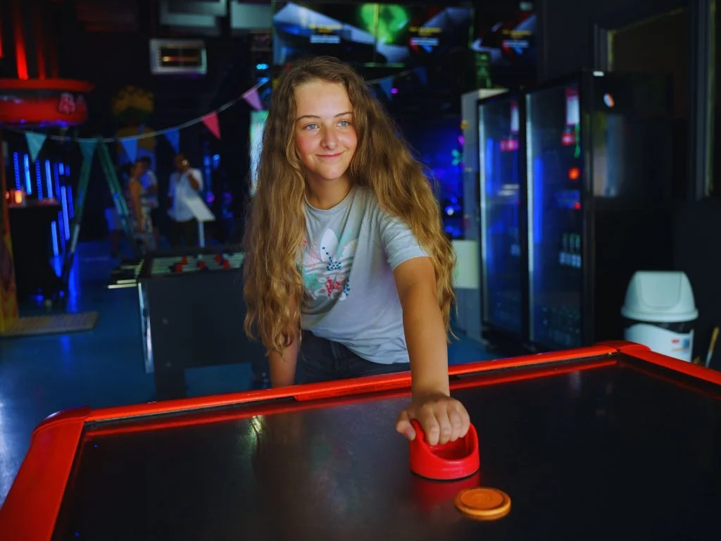 Kids playing arcade and racing games
