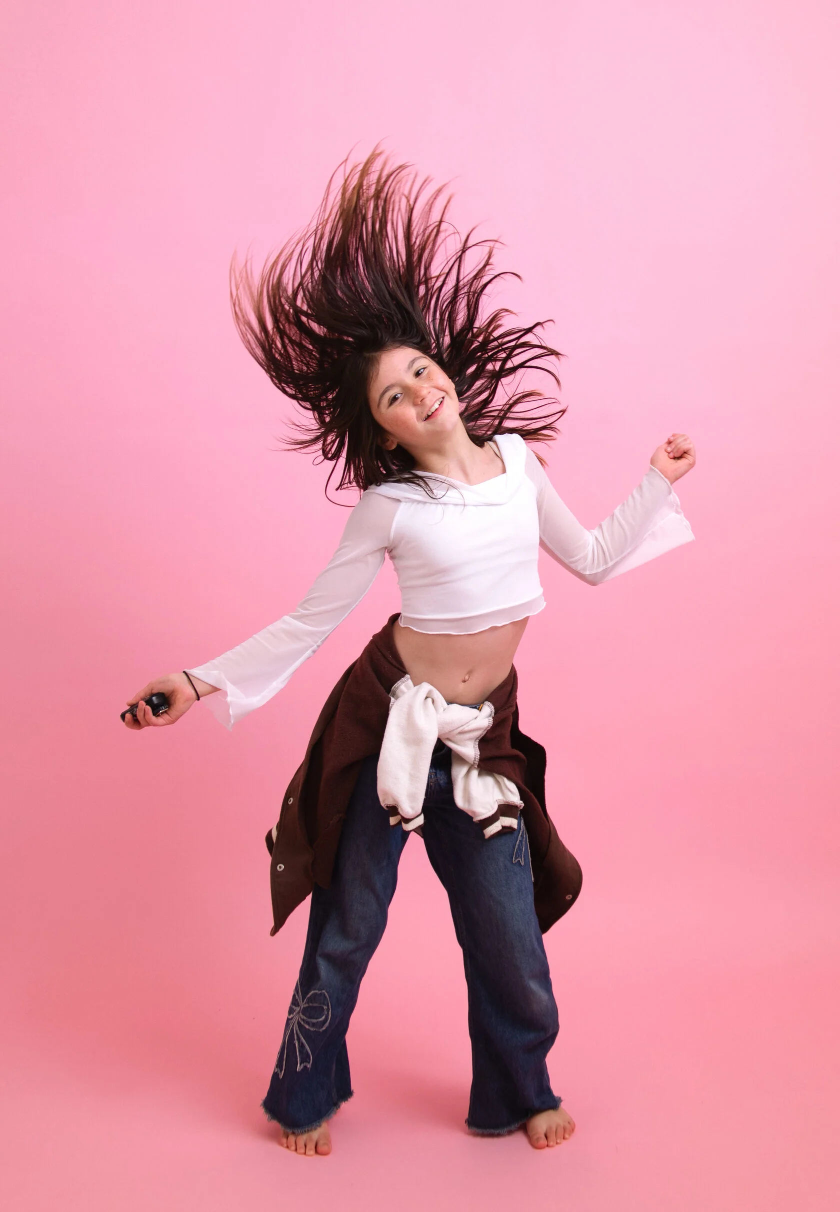 Fun children’s photo session with pink backdrop in San Francisco