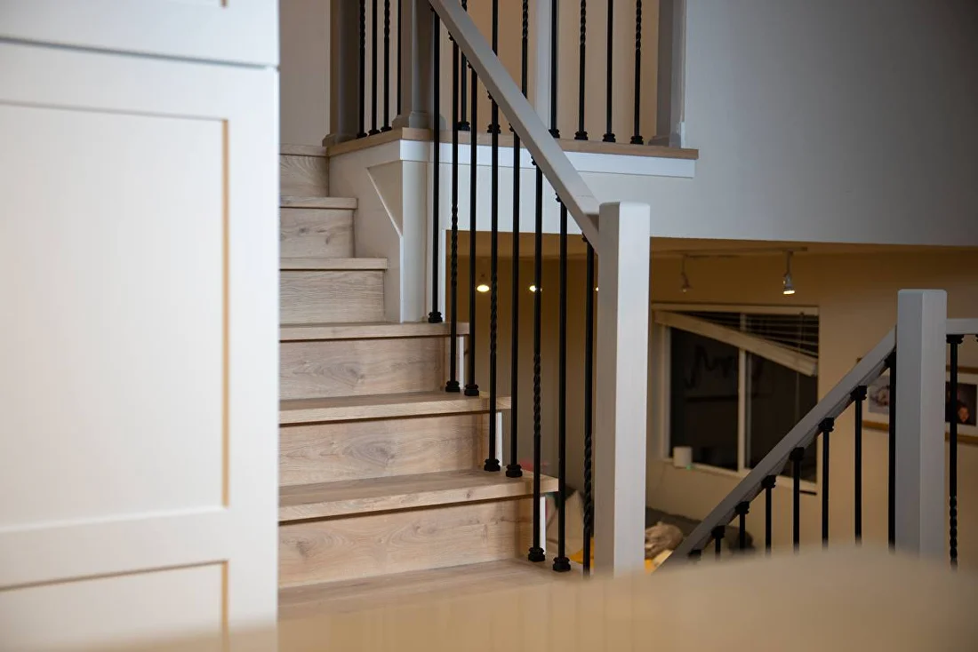 New staircase — white oak & iron balusters