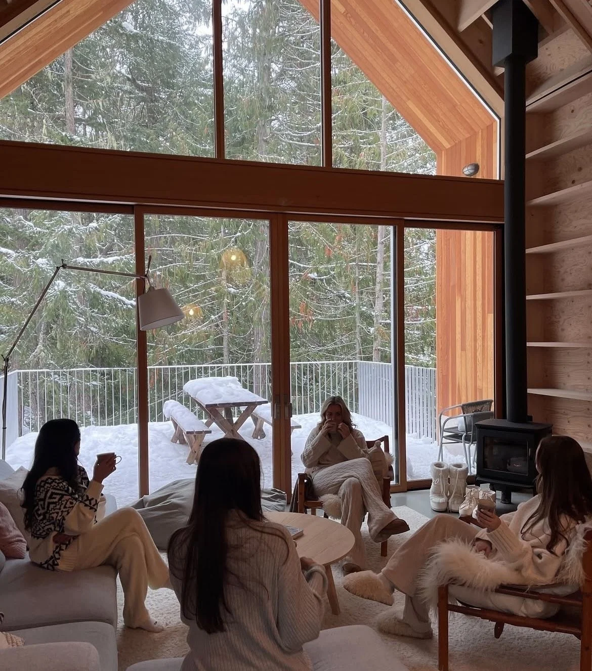 Women relaxing together in a chalet