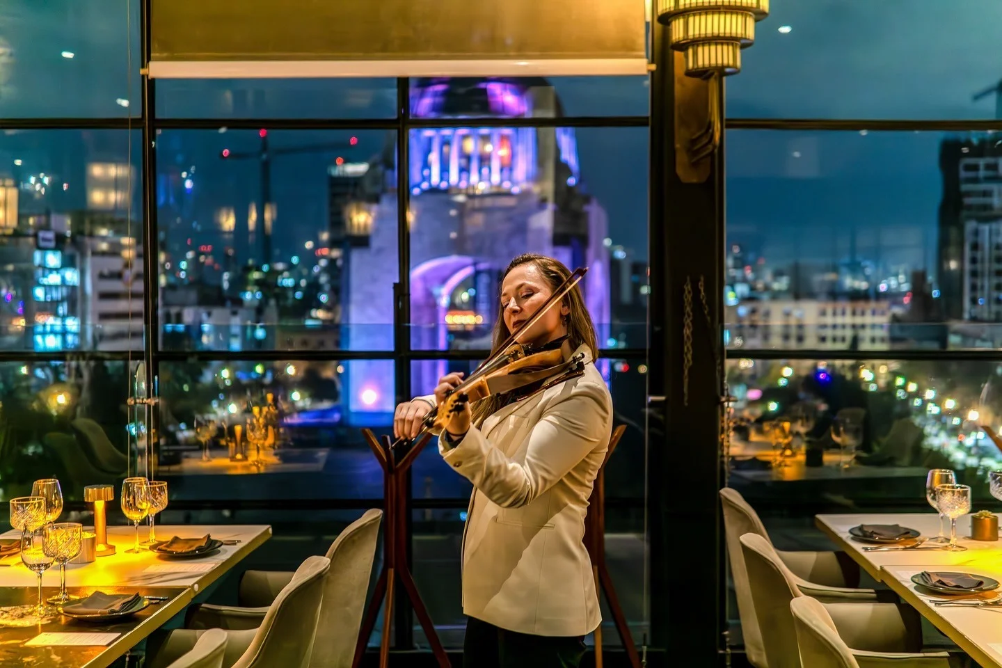 Polina performing live violin at a private corporate event