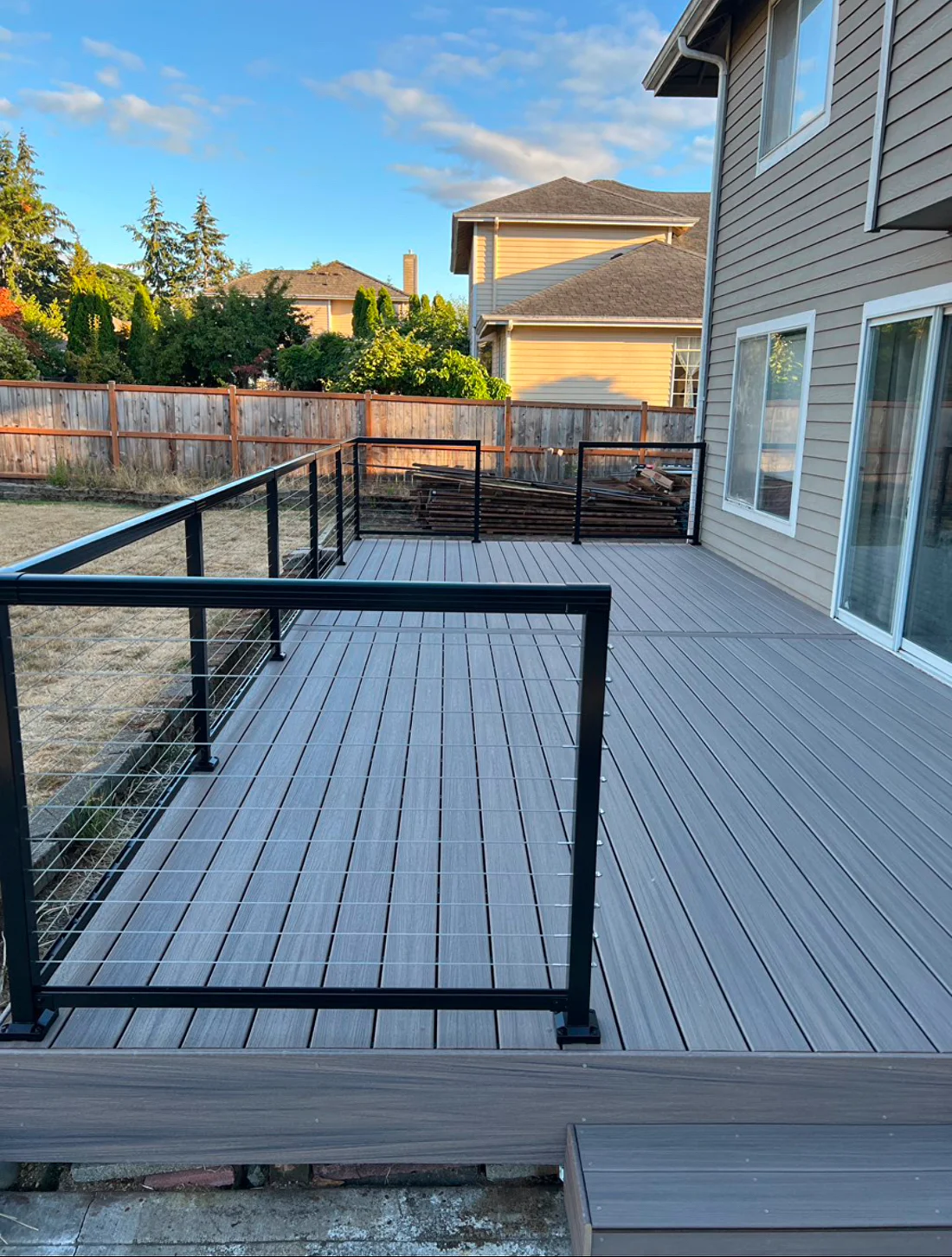 Backyard deck rebuild — composite & steel