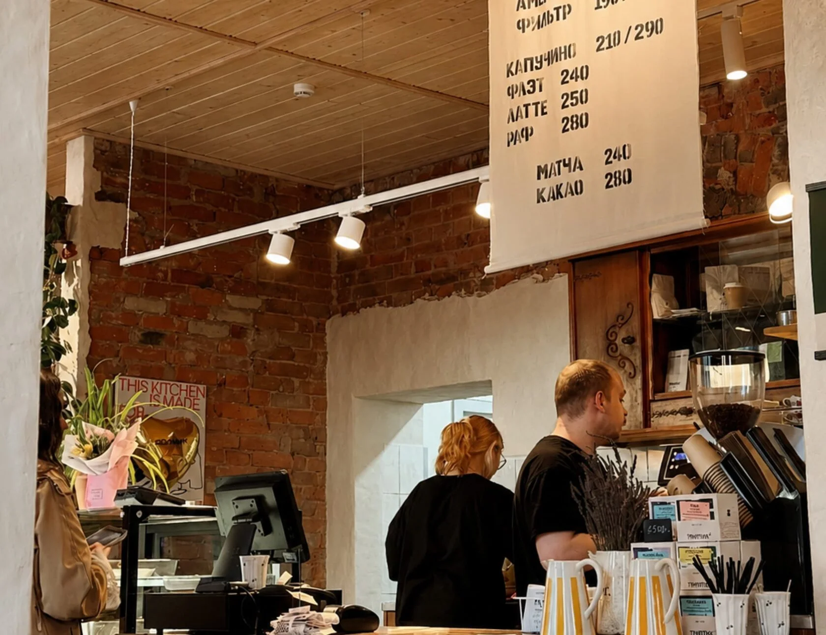 Fabric menu hanging above the café counter