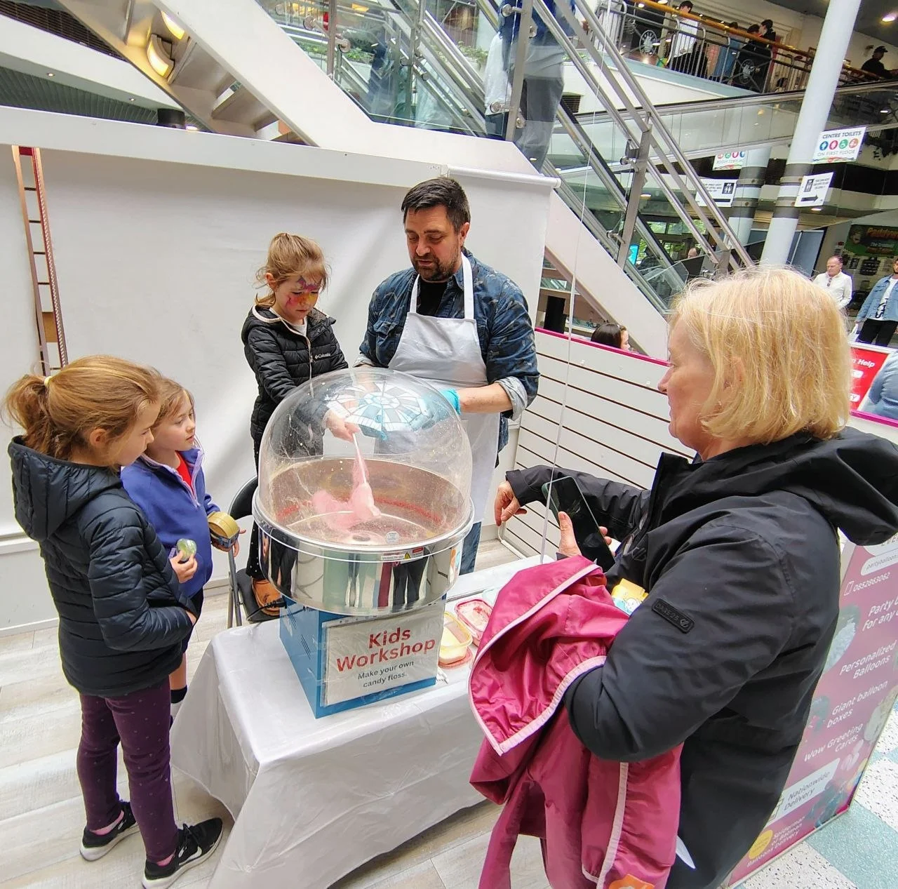Children watching an Irish Clouds candy floss workshop