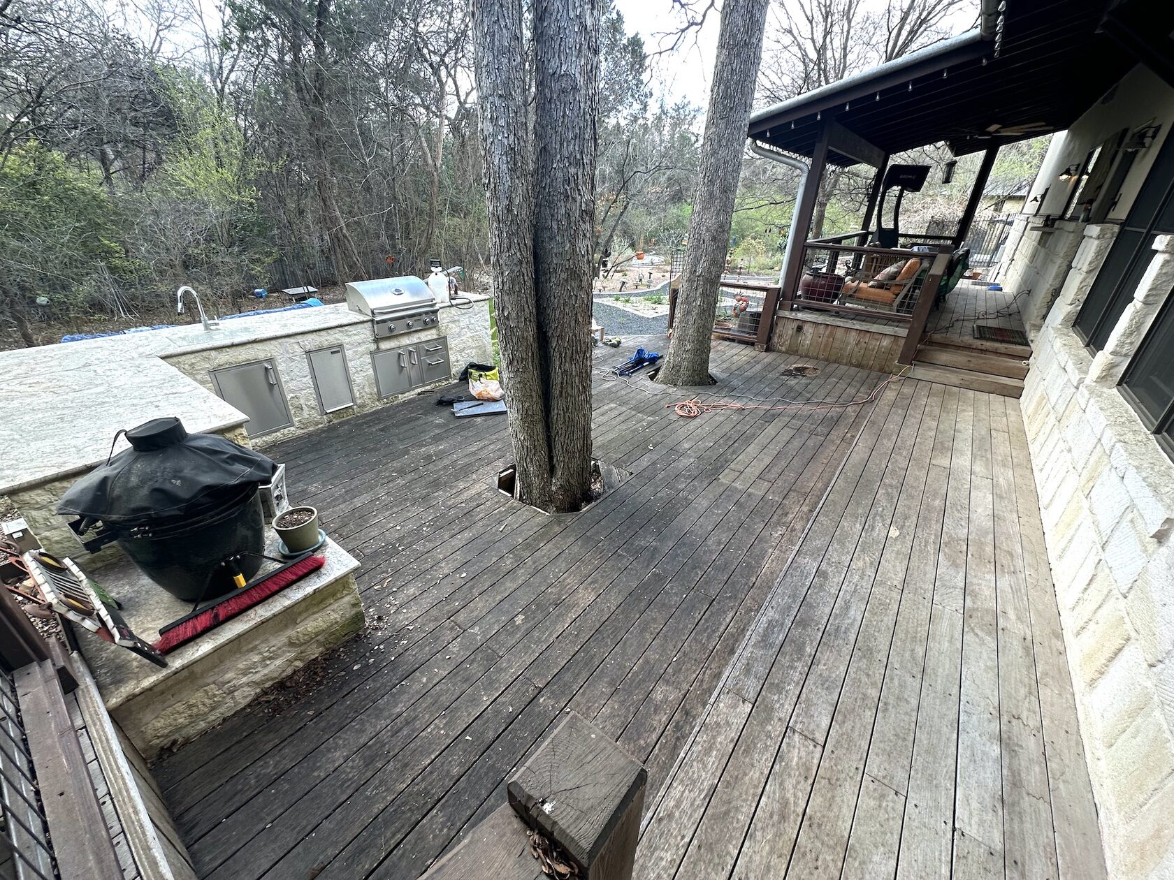 IPE deck before restoration Lakeway TX — gray oxidized weathered hardwood surface