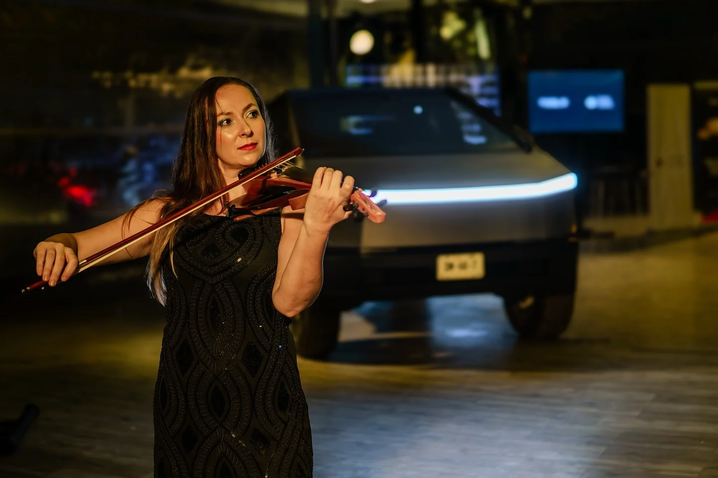 Polina performing live violin at a corporate event
