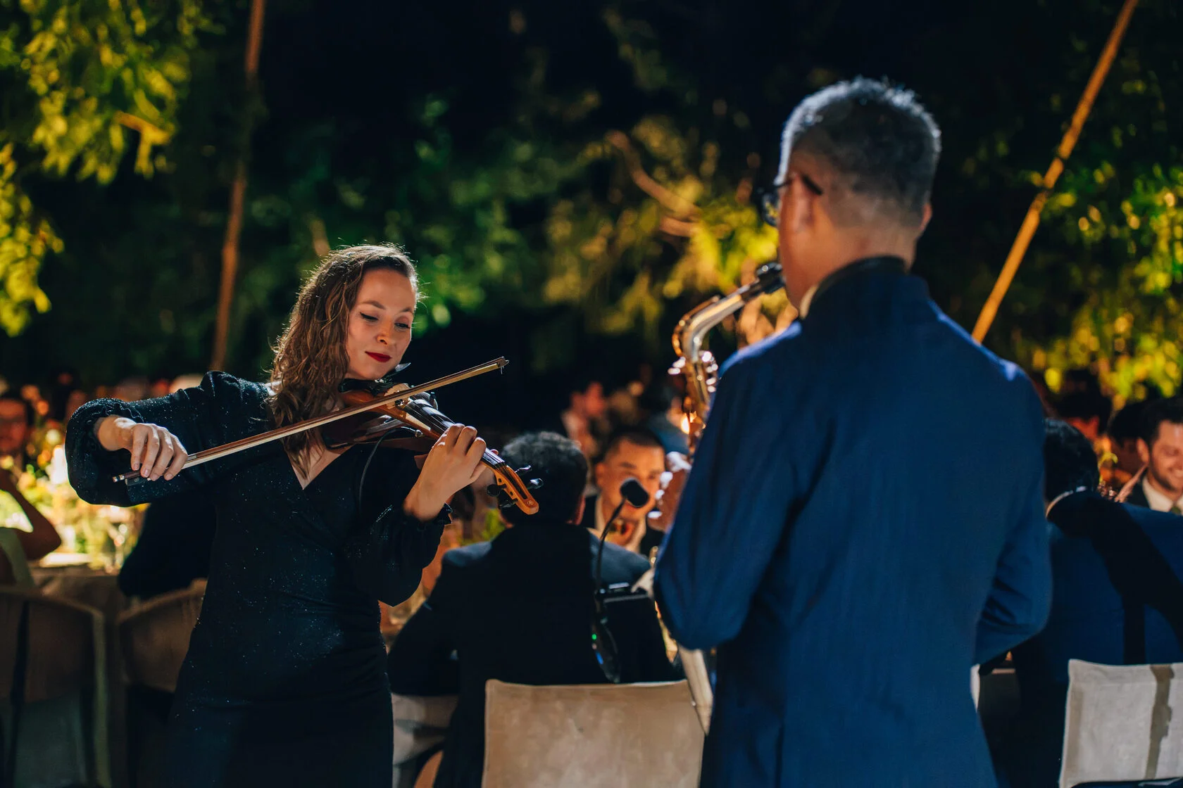 Live violin performance during a destination wedding in Mexico