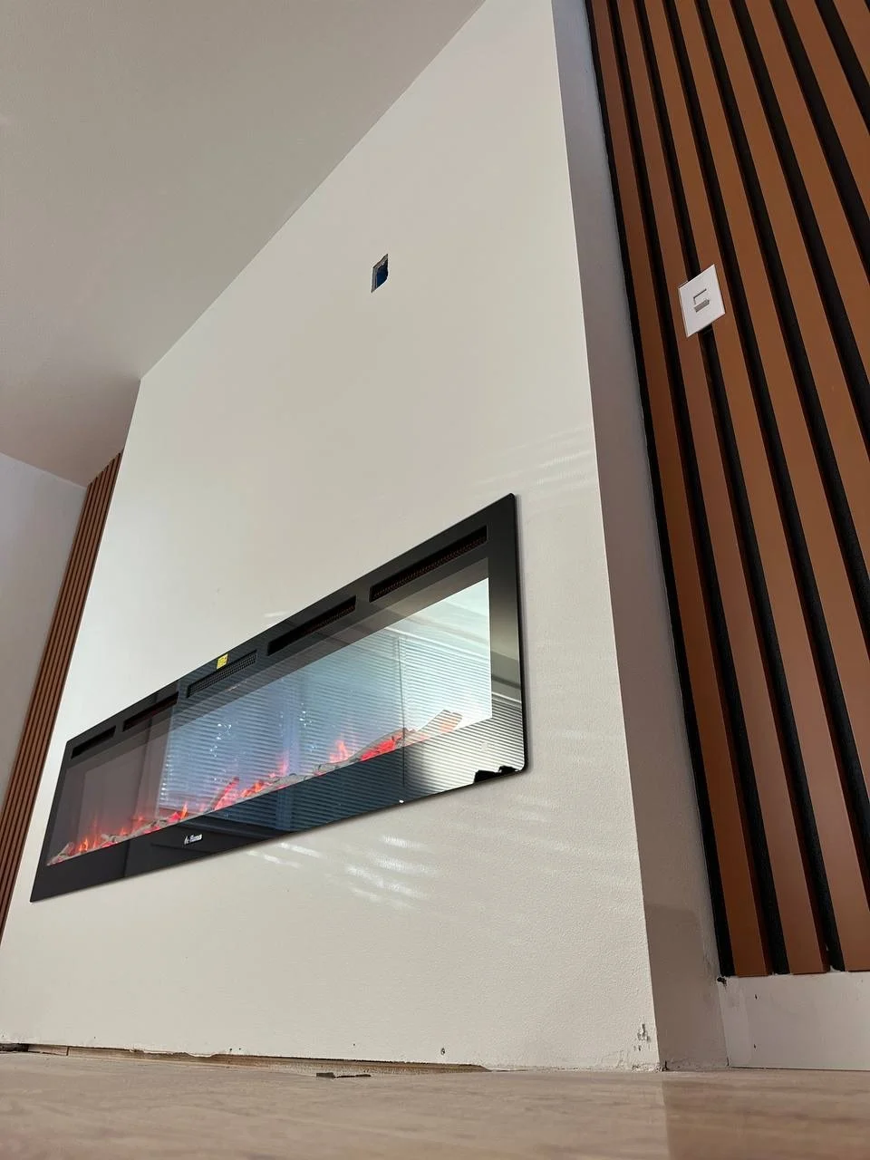 Media wall — wood slats & linear fireplace